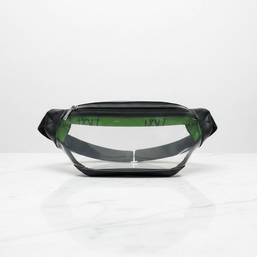 Game Time Fani clear luxury belt bag with black leather trim on marble surface