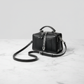 THE LUXE Bag exterior side view with crossbody strap